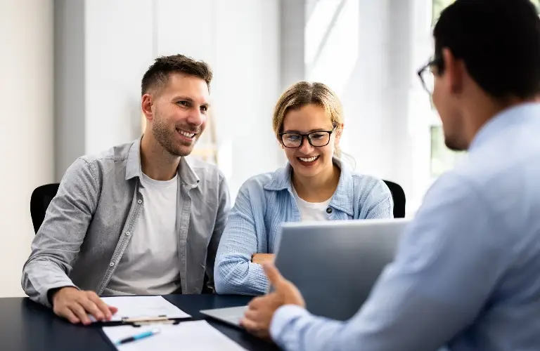 Young couple is consulting with lawyer about estate planning